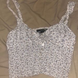forever 21 cropped tank top, white and blue floral with buttons and tie, size M